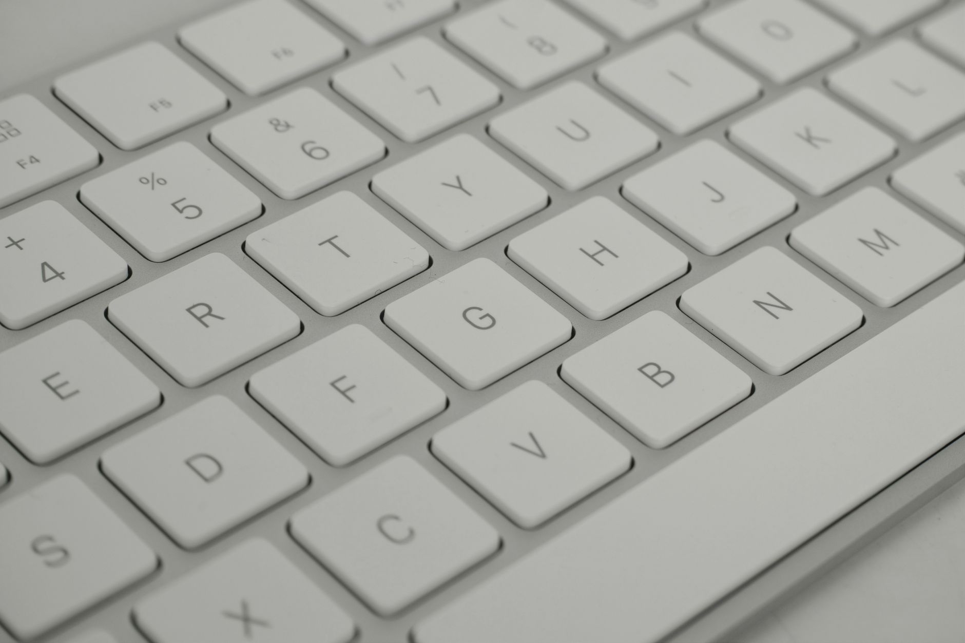 computer says no internet connection but there is - Detailed close-up of a sleek white keyboard, emphasizing modern technology.