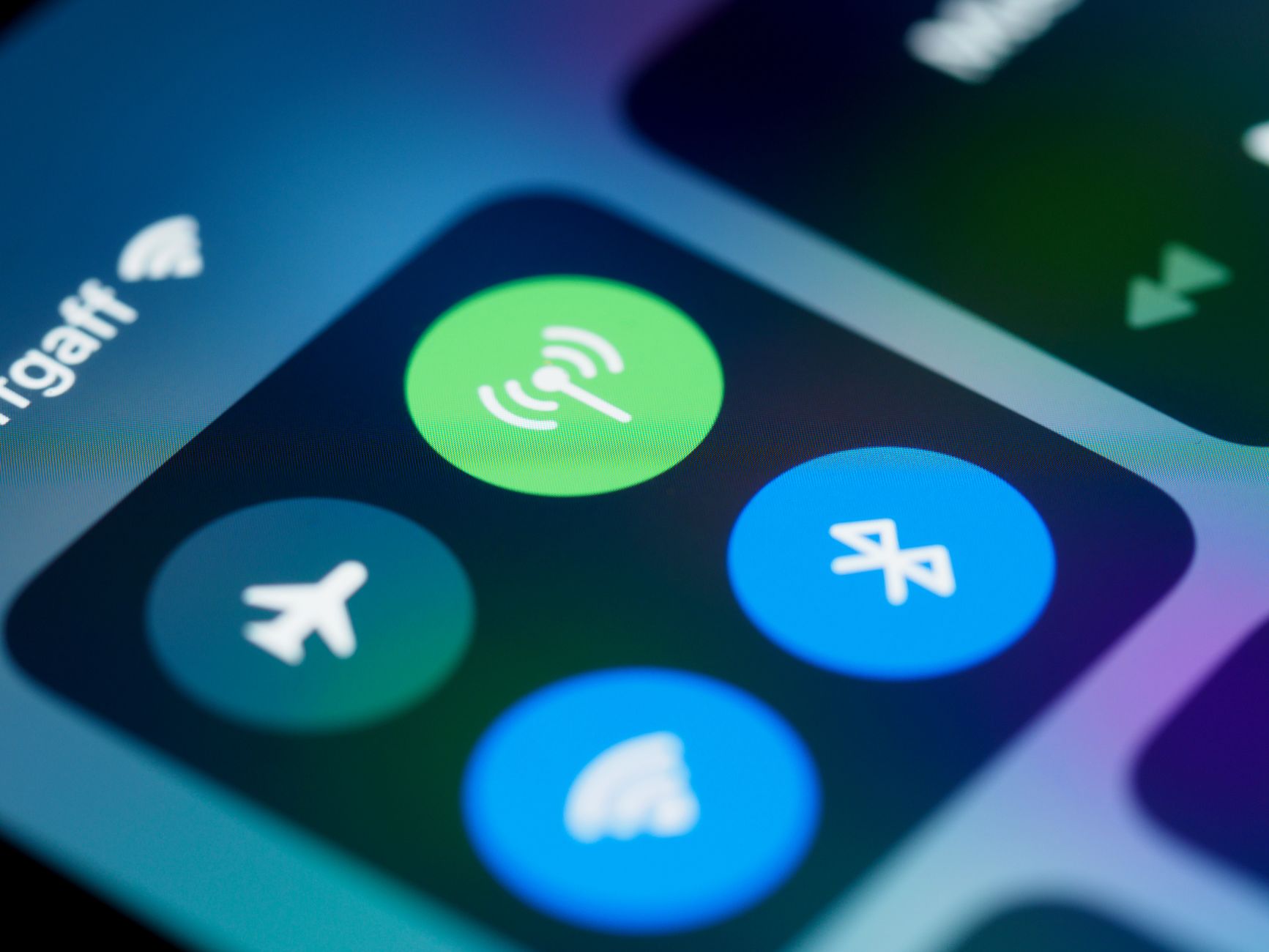 connected to wifi no internet access - Detailed close-up image of a smartphone's control center showing various connectivity icons.
