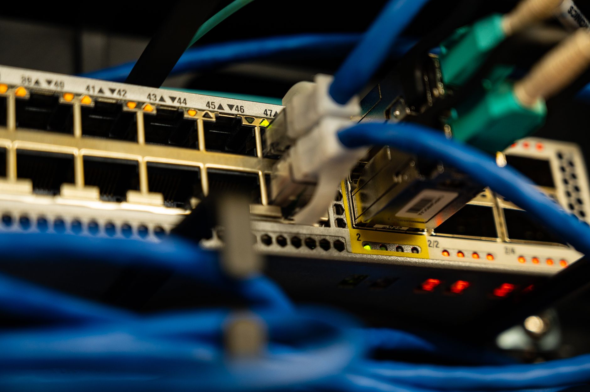 internet no internet access - Close-up image of ethernet cables plugged into a network switch, showcasing IT infrastructure.