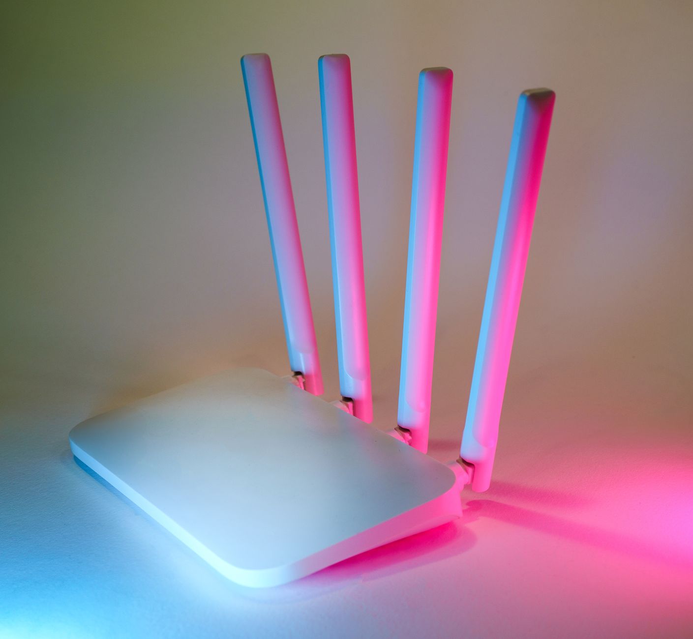 microsoft surface won't connect to wifi - A sleek wireless router enhanced by vibrant neon lights, showcasing cutting-edge technology.