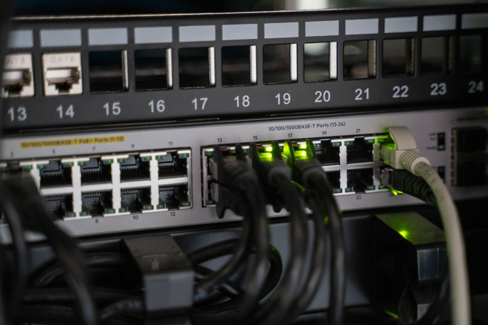 reset lan adapter windows 10 - Networking equipment with connected cables, showcasing modern technology infrastructure.