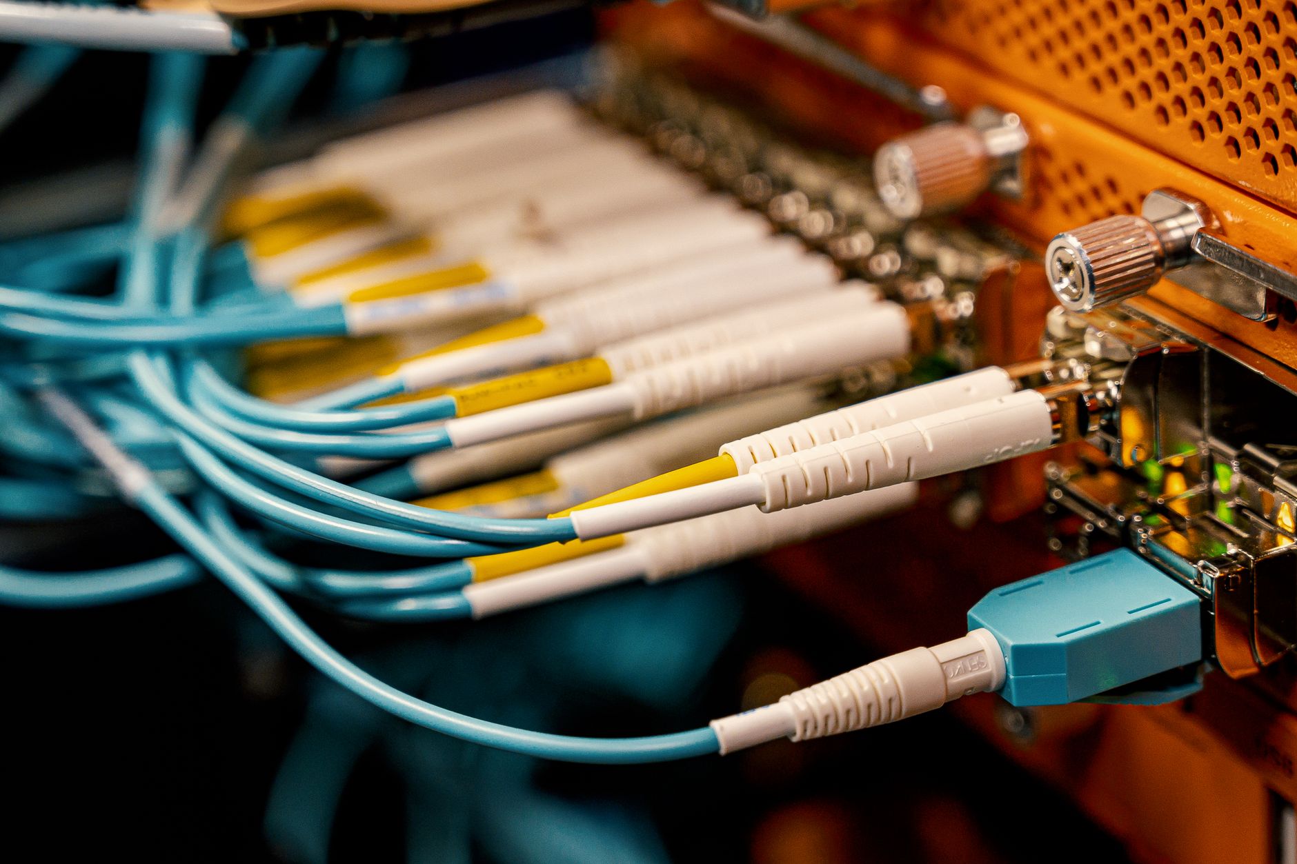 what is a networking reset - From above of optical switch equipment with many similar connectors with rubber cables and metal parts