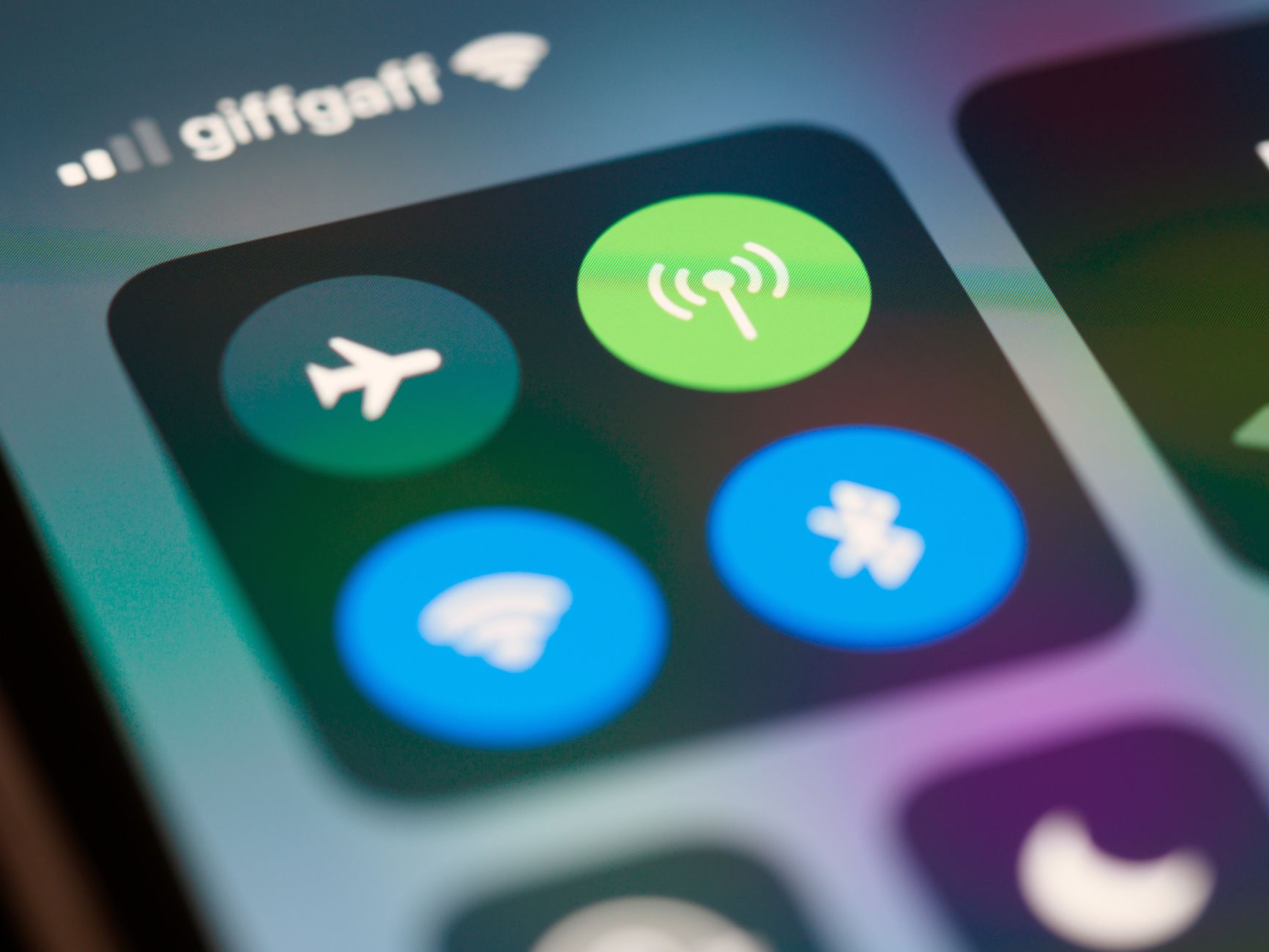 why does wifi say no internet connection - High-resolution close-up of smartphone interface showing control center icons.